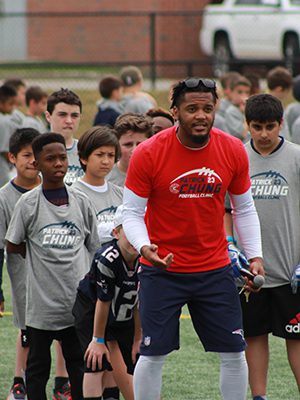Patrick Chung of the New England Patriots arrived in Westwood on Saturday for a clinic on Flahive Field. Photos by Daniel Curtin