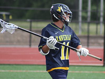 Pictured against Franklin in the Division I South quarterfinals, Sean Nizolek (11) served as one of Xaverian’s top defensive poles this season and took home the honors of second-team EMLCA All-American. Photos by Michael Flanagan