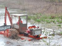 Hydro-raking cleans Perry Crouse Pond
