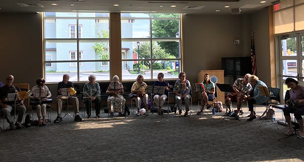 Happy Strummers entertain in Westwood