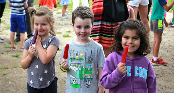 Ready for kindergarten! These young Medfielders enjoy a popsicle after their bus orientation.  Photos by Daniel Curtin