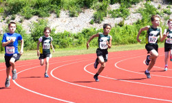 Needham youths score at track meet