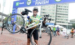 Needleman riding in Hub on Wheels