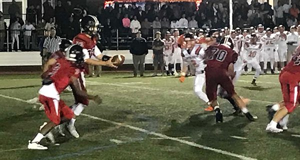 White leads Raiders over Tigers