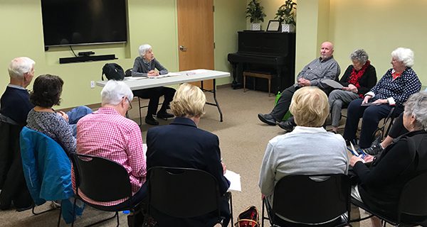 Professor Maud Chaplin talks to a group of Dover residents on the Second Amendment.