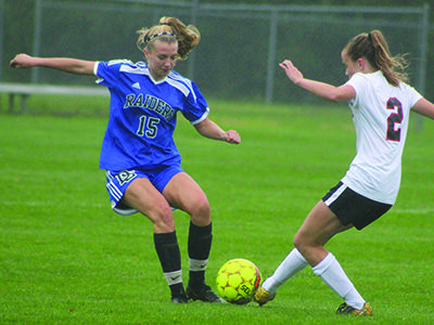 Wellesley’s Rory Clare (2) and DS’s Jillian Davis (15) fight for possession of... 			
			</div data-eio=