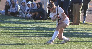 Pictured against Westwood in the 2018 South Sectionals in field hockey, Eileen Manning (9) will take her lacrosse talents to Marist next fall after getting after it one last time this spring for Needham High.