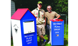 Eagle Scout Corriveau installs flag drop boxes