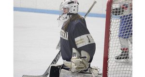 Sophomore goalie Kenzie Kelly keeps an eye on the play in front of her while recording a 15-save shutout on Saturday night in Natick. 
