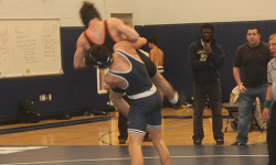 Injury-ravaged wrestling drops first match