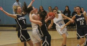 A hard foul as Medfield takes a hand to the face.