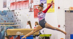 Gymnast performing a back handspring.