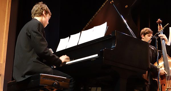 Pianist de Peyster entertaining at Cabaret