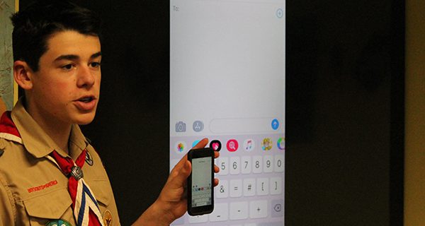 Scouts teach seniors phone technology