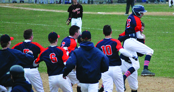 Matt Donato is mobbed after his game winning hit.  Photos by James Kinneen 