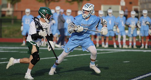 Warriors outlast Wolverines in lacrosse
