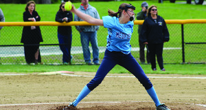 Alana Potts (pictured) fires home a pitch during her complete-game shutout against Dedham on Wednesday afternoon.