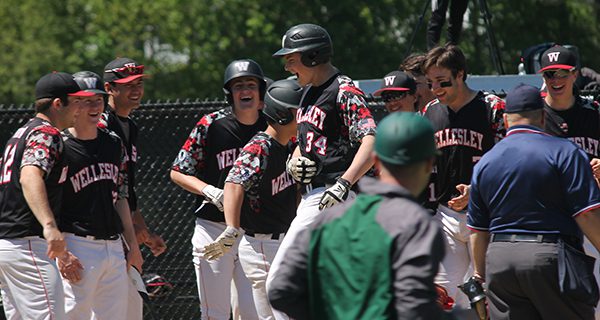 A recovering Teddy Goss showed no signs of injury celebrating his two-run homer with his team. Photos by James Kinneen
