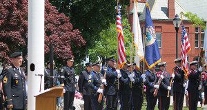 Jon Cogan and the Walpole Police stand silent during the Memorial Day service.