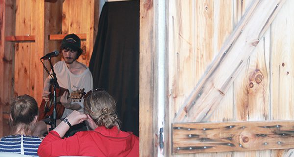 Mausteller performs one of his originals, ‘The Coffee Song,’ inside the barn.