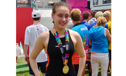 Wellesley’s Oppenheim swims to gold