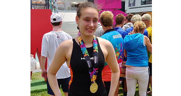 Wellesley’s Oppenheim swims to gold