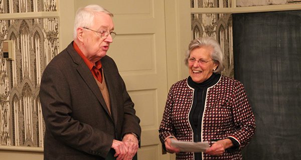 Co-president of the Westwood Historical Society Lura Provost presents John Pritchard the Quarter Century Award.