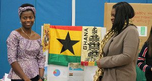 The representatives from Ghana show off their display.  Photos by James Kinneen