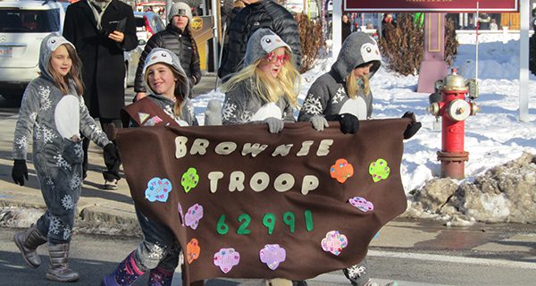 Troop 62991 wore matching penguin onesies during the parade.