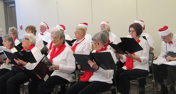 Senior Moments chorus carols in Walpole