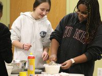 Teens cook up brownies from scratch