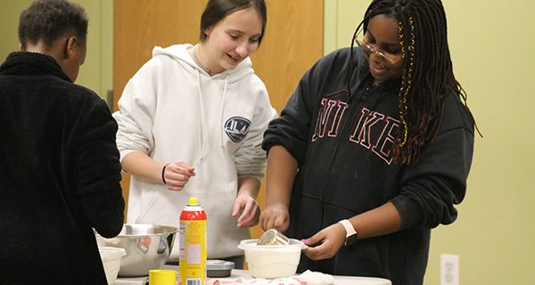 Teens cook up brownies from scratch