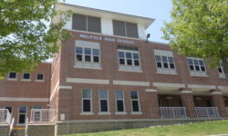 School committee votes for hybrid option