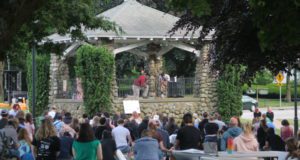 Outdoor concert in stone gazebo.