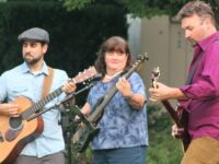 Kids play, adults listen at concert