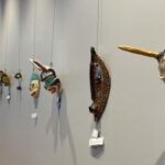 Masks adorn Needham Library