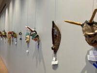 Masks adorn Needham Library