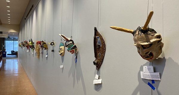Masks adorn Needham Library