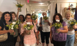 Seniors arrange flowers at COA