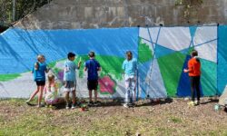Needhamites paint community mural
