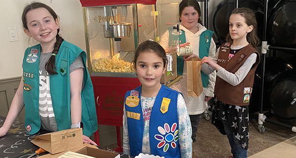 Girl Scouts Serve Coa Movie Concessions - Hometown Weekly