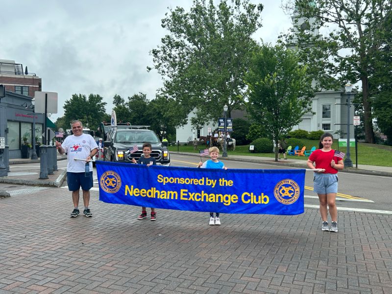 Needham parades through the Fourth