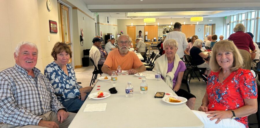 Seniors socialize over strawberry shortcake