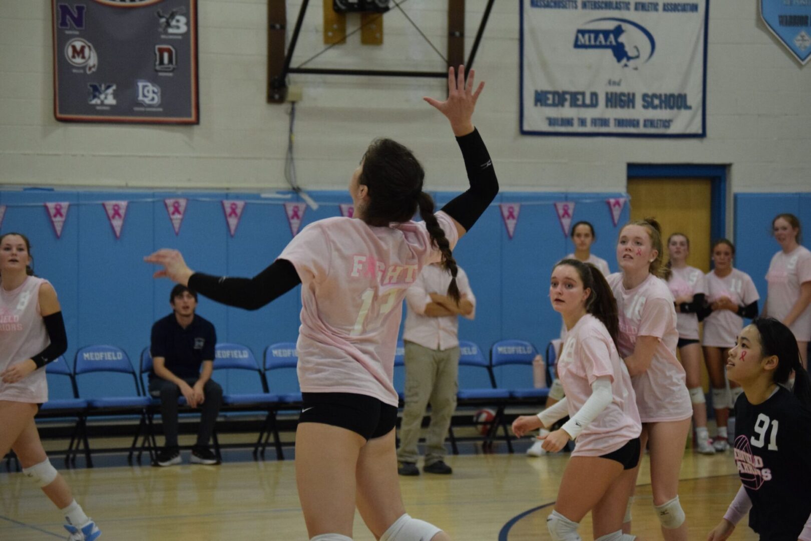 Warriors volleyball digs pink Hometown Weekly