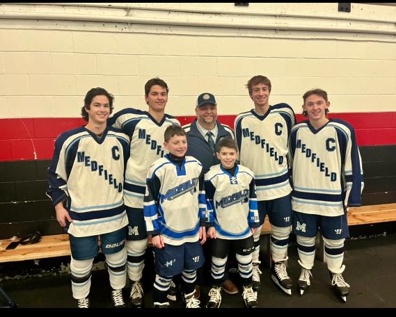 Boys’ hockey hosts captains for the day