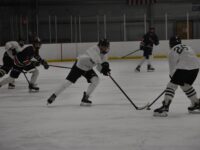 Boys’ hockey glides to victory