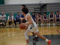 Boys’ Basketball defends home court