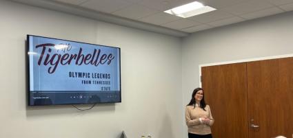 Card discusses “The Tigerbelles”