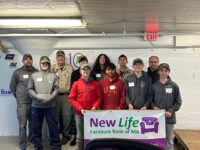 Troop 97 volunteers at New Life Furniture Bank