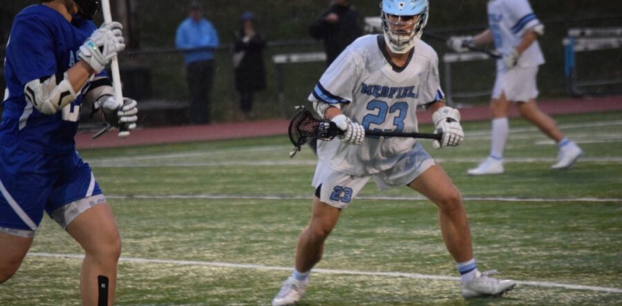 Collins Carries boys’ lax to victory